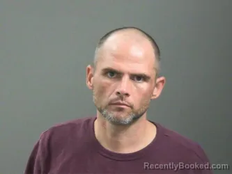 Mugshot of Joshua Dewitt booked in Washington County, Arkansas on August 9, 2026