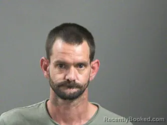 Mugshot of Joshua Scarbrough booked in Washington County, Arkansas on August 10, 2026
