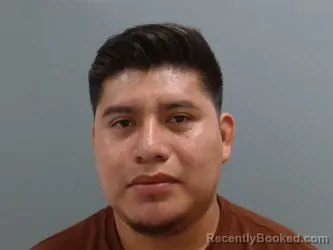 Mugshot of Carlos Gomez Mendez booked in Washington County, Arkansas on August 11, 2026