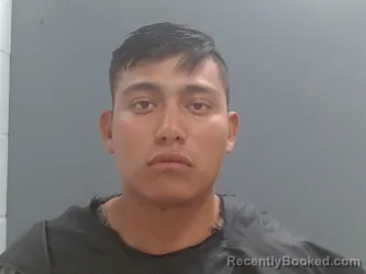 Mugshot of Carlos Garcia Flores booked in Washington County, Arkansas on August 13, 2026