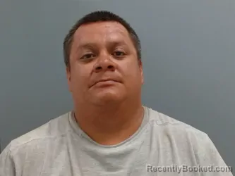 Mugshot of Eduardo Martinez-Hernandez booked in Washington County, Arkansas on August 14, 2026