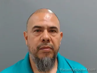 Mugshot of Alejandro Virginio Martinez booked in Washington County, Arkansas on August 16, 2026