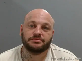 Mugshot of Dustin Frakes booked in Washington County, Arkansas on September 13, 2026