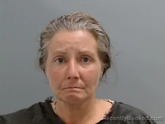 Mugshot of Kristy Acuff booked in Washington County, Arkansas on September 30, 2026