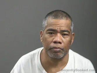 Mugshot of David Alesrak booked in Washington County, Arkansas on October 4, 2026