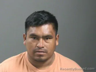 Mugshot of Zacarias Oxom-Choj booked in Washington County, Arkansas on October 4, 2026