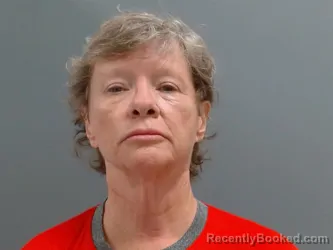 Mugshot of Theresa Lusk booked in Washington County, Arkansas on October 6, 2026