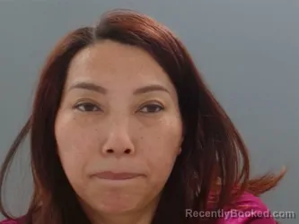 Mugshot of Fang Zhou booked in Washington County, Arkansas on October 6, 2026