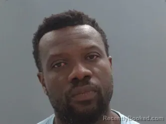 Mugshot of Isaac Nuhu booked in Washington County, Arkansas on October 7, 2026