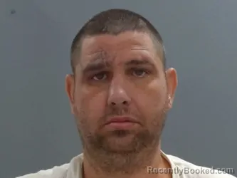 Mugshot of Lloyd Carter booked in Washington County, Arkansas on October 9, 2026