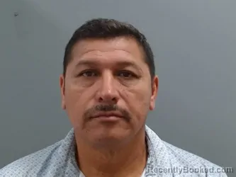 Mugshot of Mario Mendez De La Cruz booked in Washington County, Arkansas on October 13, 2026