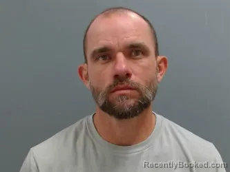 Mugshot of Reid Lane booked in Washington County, Arkansas on October 24, 2026