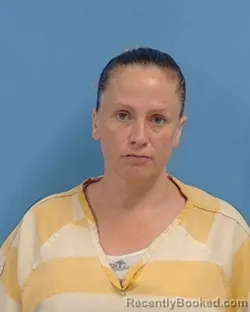 Mugshot of Amy Lois Hacker booked in White County, Arkansas on April 21, 2026