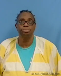 Mugshot of Evelyn Delores Holland booked in White County, Arkansas on April 21, 2026