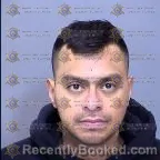 Mugshot of Christian Madrigal