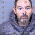 Mugshot of Carlos Alvarado