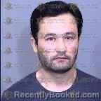 Mugshot of Manzoor Hassani