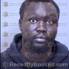 Mugshot of Majok William Madut