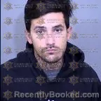 Mugshot of Logan Daniel Romano