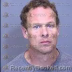 Mugshot of Adam Carver