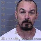 Mugshot of Travis James Hughes