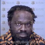 Mugshot of Mohamed Mansaray