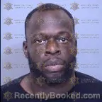 Mugshot of Kalambay Claude Mukeba booked in Maricopa County, Arizona on March 6, 2026