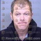 Mugshot of Christopher James Raymond Hughes booked in Maricopa County, Arizona on March 7, 2026