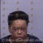 Mugshot of Shcova Johnson booked in Maricopa County, Arizona on April 1, 2026