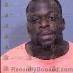 Mugshot of Kalambay Claude Mukeba booked in Maricopa County, Arizona on April 2, 2026