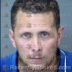 Mugshot of Oscar Omar Revilla Regalado booked in Maricopa County, Arizona on May 8, 2026