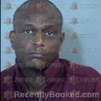 Mugshot of Minelik T Sisay booked in Maricopa County, Arizona on May 30, 2026