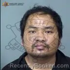 Mugshot of Rem Ruat booked in Maricopa County, Arizona on July 31, 2026
