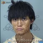 Mugshot of Poe Reh booked in Maricopa County, Arizona on August 2, 2026