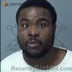 Mugshot of Owen Prince Ogunsuyi booked in Maricopa County, Arizona on August 3, 2026