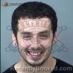 Mugshot of Koll Brandon Madril booked in Maricopa County, Arizona on August 7, 2026