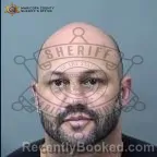 Mugshot of Jovan Valentino Bonelli booked in Maricopa County, Arizona on August 8, 2026