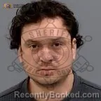 Mugshot of Daniel Alfonso Romo booked in Maricopa County, Arizona on August 8, 2026