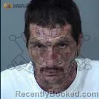 Mugshot of Alex Bonzo Covrig booked in Maricopa County, Arizona on August 11, 2026
