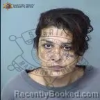 Mugshot of Champagne Costello booked in Maricopa County, Arizona on August 12, 2026