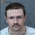 Mugshot of Logan Gabriel Sy booked in Maricopa County, Arizona on August 13, 2026