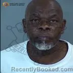 Mugshot of John Junior Hollins booked in Maricopa County, Arizona on August 14, 2026