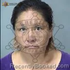 Mugshot of Beatrice Marie-Swan Sheka booked in Maricopa County, Arizona on September 12, 2026