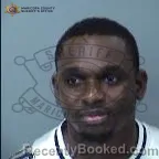 Mugshot of Gloire Depardieu Mougani booked in Maricopa County, Arizona on September 14, 2026