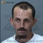 Mugshot of Charlie Garcia Wolf booked in Maricopa County, Arizona on September 14, 2026