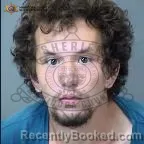 Mugshot of Logan Asproudis booked in Maricopa County, Arizona on September 23, 2026