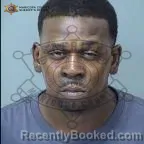 Mugshot of Kentrail Dar'winn Ka'vonnie Swan booked in Maricopa County, Arizona on October 1, 2026