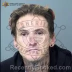 Mugshot of Marcos Bernard Melius booked in Maricopa County, Arizona on October 1, 2026
