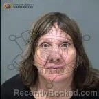 Mugshot of Catherine Marie Mullins booked in Maricopa County, Arizona on October 3, 2026