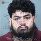 Mugshot of Angel Igor Olguin-Hernandez booked in Maricopa County, Arizona on October 4, 2026